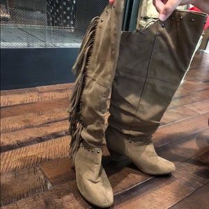 Size 6 1/2. From Buckle. Heel boots. Fringe